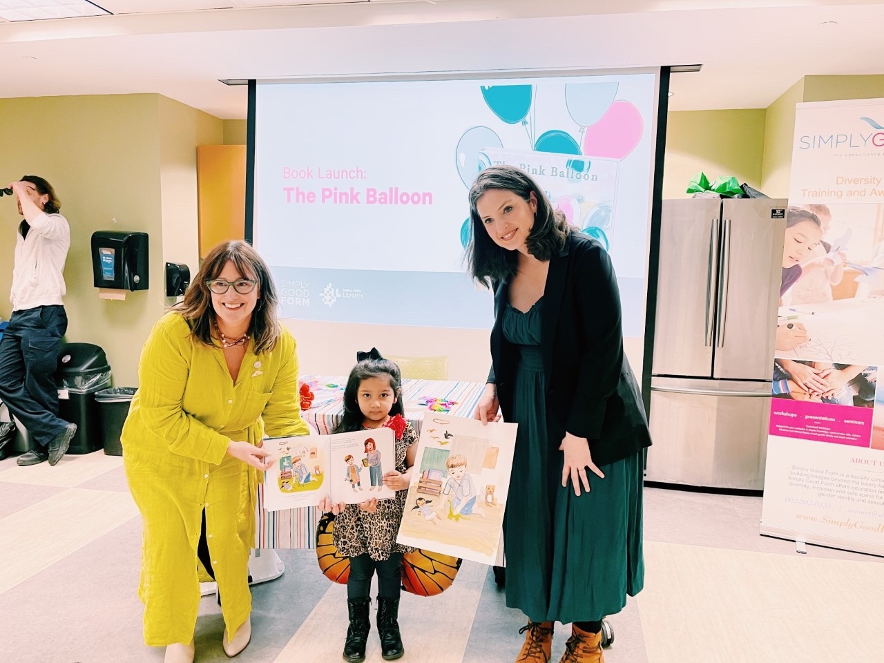 Author Cynthia Sweeney and Illustrator Briana Core Scott with Nadine at The Pink Balloon celebration at Keshen Goodman Library